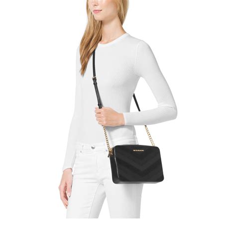 black michael kors jet set|Michael Kors crossbody jet set.